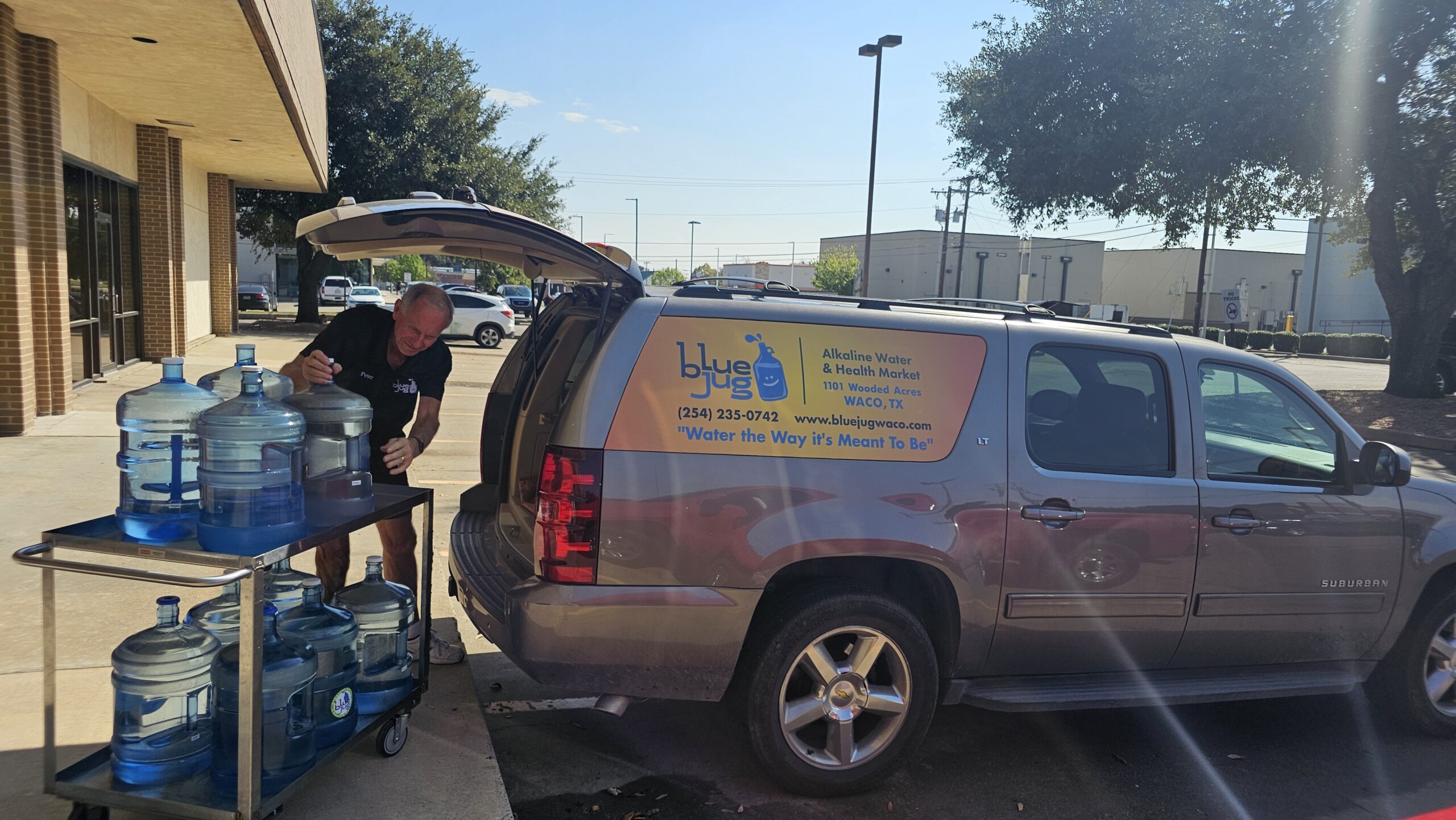Natural electrolyte water for athletes and wellness at Blue Jug Waco